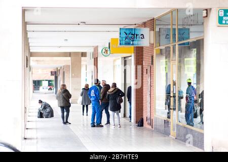 Gijon, Spain. 16th February, 2020. People waits in front of a supermarket on February 16, 2020 in Gijon, Spain, after Spanish government approved Spain’s state of alarm decree to confine the whole country and reduce coronavirus infections. Coronavirus COVID-19 infections in Spain increase 1.000 in a day to reach 9.190, with more than 300 deaths. ©David Gato/Alamy Live News Stock Photo