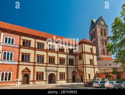 Fürstenhof castle courtyard and St Mary Church tower in Wismar, Mecklenburg-West Pomerania, Germany Stock Photo
