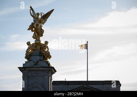 The Royal Standard flies above Buckingham Palace, London, as Queen Elizabeth II returned to central London despite the coronavirus outbreak. Stock Photo