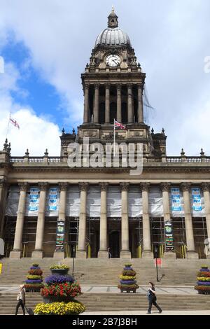 LEEDS, UK - JULY 11, 2016: People visit City Hall in Leeds, UK. Leeds urban area has 1.78 million population. Stock Photo