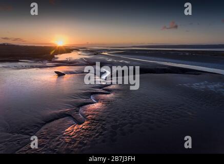 Sunset over the Loughor estuary Stock Photo
