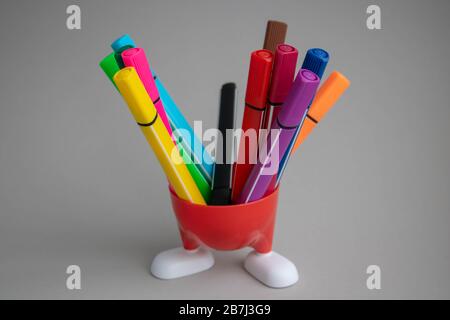Lots of assorted colors marker pens isolated on gray background. Stock Photo
