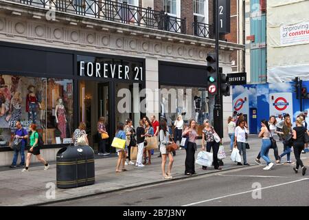 LONDON, UK - JULY 7, 2016: People shop at Forever 21 store Oxford Street in London. Oxford Street has approximately half a million daily visitors and Stock Photo