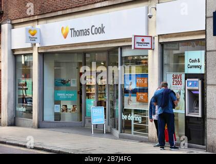 LEEDS, UK - JULY 12, 2016: Thomas Cook travel agent in Leeds, UK. Thomas Cook Group is a global vacation company that collapsed in 2019.
