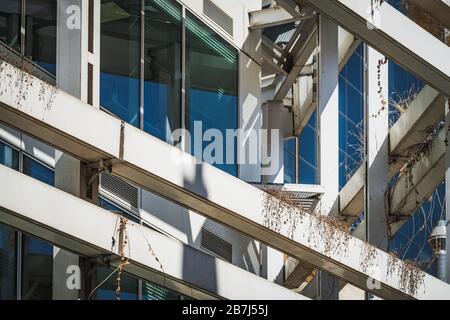 Blue windows and aluminum structures of the facade of an office building Stock Photo