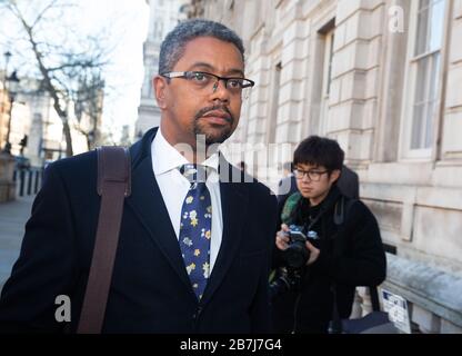 Vaughan Gething, Minister for Health  for Wales, arrives for the COBRA meeting, following the first death from the Coronavirus in Wales. Stock Photo