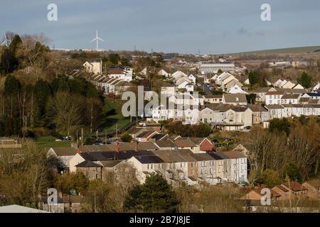 MERTHYR TYDFIL, WALES - 16th March 2020 - Merthyr Tydfil landscape showing terrace housing on a rare sunny day in the Welsh Valleys. Stock Photo