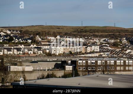 MERTHYR TYDFIL, WALES - 16th March 2020 - Merthyr Tydfil landscape showing terrace housing on a rare sunny day in the Welsh Valleys. Stock Photo