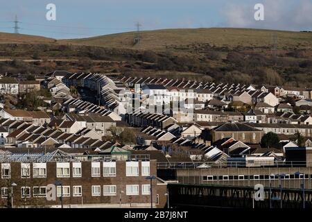 MERTHYR TYDFIL, WALES - 16th March 2020 - Merthyr Tydfil landscape showing terrace housing on a rare sunny day in the Welsh Valleys. Stock Photo