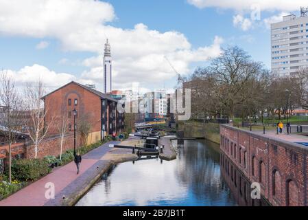 View along the Birmingham and Fazeley Canal in Birmingham city centre, UK Stock Photo