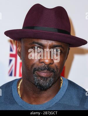 (FILE) Idris Elba Tests Positive for Coronavirus COVID-19. Idris Elba has tested positive for coronavirus, the actor said on Monday, March 16, 2020 on Twitter. WEST HOLLYWOOD, LOS ANGELES, CALIFORNIA, USA - FEBRUARY 26: Actor Idris Elba arrives at The Film Is GREAT Reception To Honor The British Nominees Of The 88th Annual Academy Awards held at the Fig & Olive on February 26, 2016 in West Hollywood, Los Angeles, California, United States. (Photo by Xavier Collin/Image Press Agency) Stock Photo