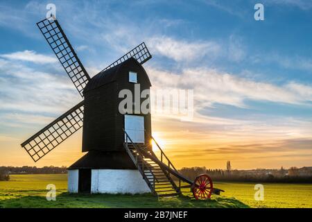 Ivinghoe, Buckinghamshire, England. Monday 16th March 2020. UK Weather. After a dry day with sunshine and a gentle breeze in Ivinghoe, Buckinghamshire, the sun sets behind the famous Pitstone Windmill on the Ridgeway National Trail. Credit: Terry Mathews/Alamy Live News Stock Photo