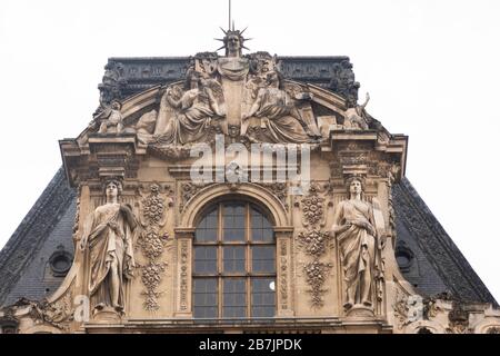 Louvre courtyard buildings roof sculptures Stock Photo