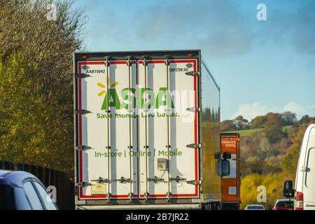 CORYTON, CARDIFF, WALES - NOVEMBER 2018: Articulated lorry driving on the M4 motorway delivering goods to the Asda supermarket near Cardiff Stock Photo