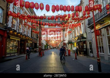 London, UK. 16th March 2020. An almost deserted Gerrard street in London's Chinatown. Stock Photo