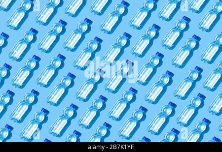 Mineral water bottles on blue background Stock Photo