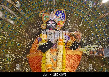 Beawar, India. 15th Mar, 2020. Indian artist from Mathura dressed up as Lord Krishna dancing and playing flowers Holi during the Fag Mahotsav after the Holi Festival in Beawar. (Photo by Sumit Saraswat/Pacific Press) Credit: Pacific Press Agency/17�Թ����� Live News Stock Photo