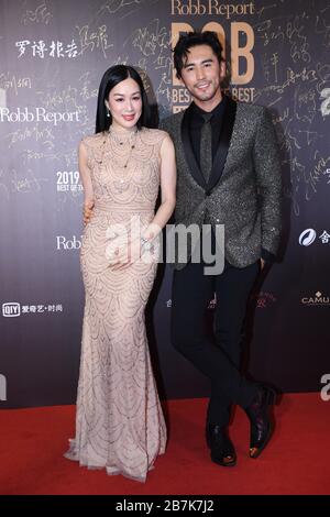 Canadian actress and restauratrice Christy Chung, left, attends a promotional event of Robb Report, a luxury magazine with husband Lunshuo Zhang in Be Stock Photo