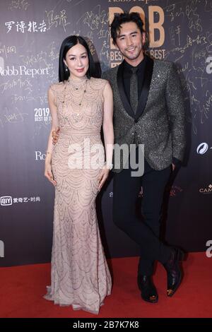 Canadian actress and restauratrice Christy Chung, left, attends a promotional event of Robb Report, a luxury magazine with husband Lunshuo Zhang in Be Stock Photo