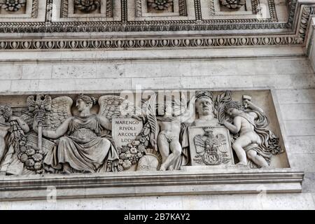 Interior ceiling with the floral pattern and sculpture with words Marenco, Rivoli, Arcole, Lodi is listing battles at Arc De Triomphe in Paris, France Stock Photo