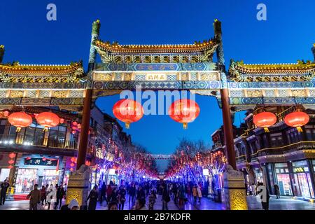 Pedestrians walk in Qianmen Walking Street where all lights turn on to celebrate the upcoming Spring Festival, Beijing, China, 20 January 2020. *** Lo Stock Photo