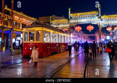 Pedestrians walk in Qianmen Walking Street where all lights turn on to celebrate the upcoming Spring Festival, Beijing, China, 20 January 2020. *** Lo Stock Photo