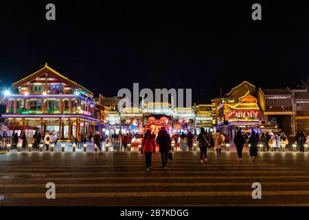 Pedestrians walk in Qianmen Walking Street where all lights turn on to celebrate the upcoming Spring Festival, Beijing, China, 20 January 2020. *** Lo Stock Photo