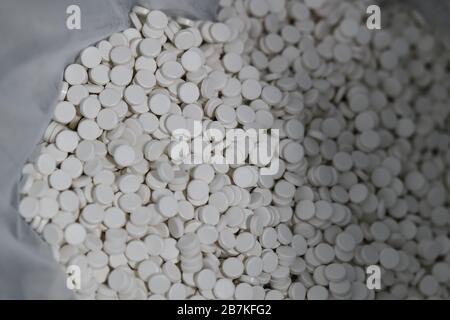 --File--In this undated and unlocated photo, a person shows Arbidol hydrochloride pills in China. Stock Photo