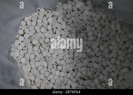 --File--In this undated and unlocated photo, a person shows Arbidol hydrochloride pills in China. Stock Photo