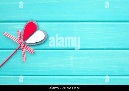 Postcard to the day of St. Valentine. Blue wood background Stock Photo