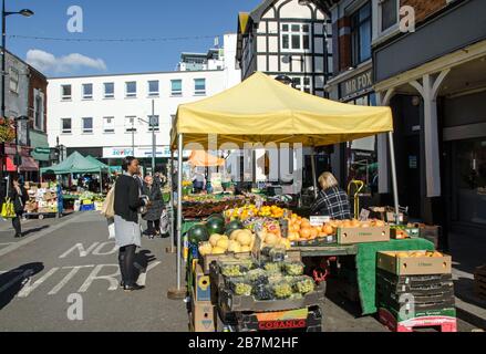 London, UK - October 2, 2019:  Shoppers and stallholders at the busy Surrey Street Market in Croydon, South London. Stock Photo