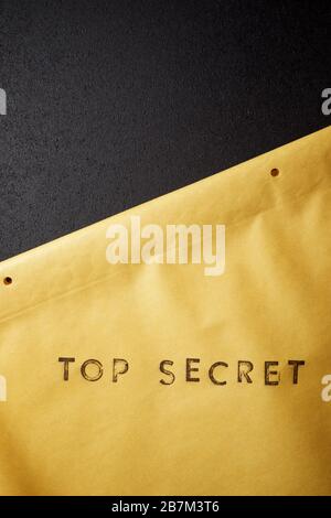 Top secret sentence on a brown envelope. Stock Photo