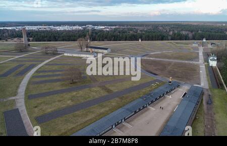 Oranienburg, Germany. 04th Mar, 2020. The grounds of the Sachsenhausen memorial (aerial photograph taken with a drone). The accommodation barracks were built in four rows around the semicircular roll call area. The Sachsenhausen concentration camp was built in the summer of 1936 by prisoners from the Emsland camps. Between 1936 and 1945, more than 200,000 people were imprisoned in Sachsenhausen concentration camp. Credit: Patrick Pleul/dpa-Zentralbild/ZB/dpa/Alamy Live News Stock Photo