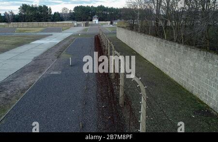 Oranienburg, Germany. 04th Mar, 2020. Fence systems of the Sachsenhausen memorial (aerial photo with a drone). The accommodation barracks were built in four rows around the semicircular roll call area. The Sachsenhausen concentration camp was built in the summer of 1936 by prisoners from the Emsland camps. Between 1936 and 1945, more than 200,000 people were imprisoned in Sachsenhausen concentration camp. Credit: Patrick Pleul/dpa-Zentralbild/ZB/dpa/Alamy Live News Stock Photo