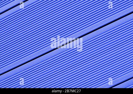 Vinyl siding texture, blue color. Modern plastic wall cladding protective material for houses and small apartment buildings. Wood clapboard imitation Stock Photo