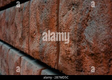 Grunge red wall texture. Beautiful red textured stucco on the wall. Background from red stucco. Cement Red Stock Photo