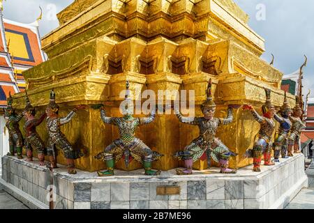 Gold sculptures in the grand palace in Bangkok, Thailand