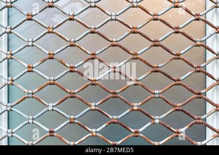 Steel security grill on a shop window Stock Photo