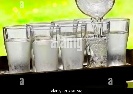 Water is essential to living organisms. It is the most plentiful compound on Earth. Eight glasses a day is recommended for a healthy diet. Stock Photo