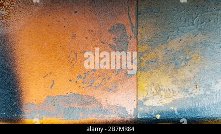 Abstract grunge surface orange gold golden yellow glare background. abstract yellow background texture. Background from old and rusty metal. Stock Photo