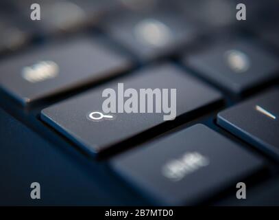 Search key on laptop black keyboard on chromebook chrome os Stock Photo
