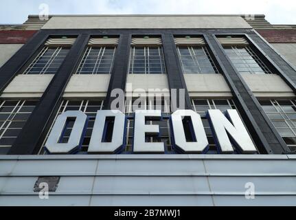 An Odeon cinema in South Woodford, London, which has closed due to coronavirus. On Monday Prime Minister Boris Johnson called on people to stay away from pubs, clubs and theatres, work from home if possible and avoid all non-essential contacts and travel in order to reduce the impact of the coronavirus pandemic. Stock Photo