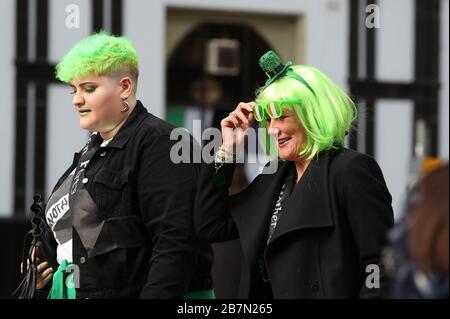 St Patrick's day revellers in Edinburgh, the day after Prime Minister Boris Johnson called on people to stay away from pubs, clubs and theatres, work from home if possible and avoid all non-essential contacts and travel in order to reduce the impact of the coronavirus pandemic. Stock Photo