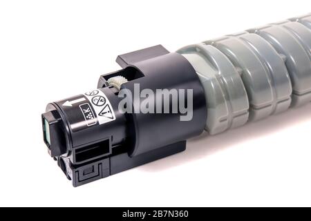 cartridges for laser printers aligned on a white background. Stock Photo