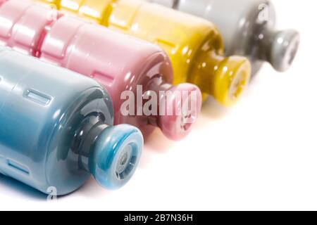 cartridges for laser printers aligned on a white background. Stock Photo