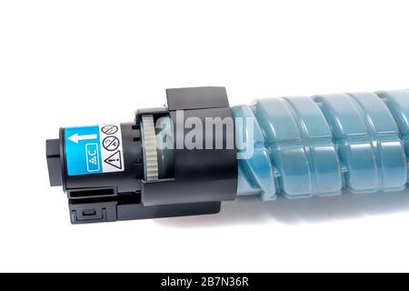cartridges for laser printers aligned on a white background. Stock Photo