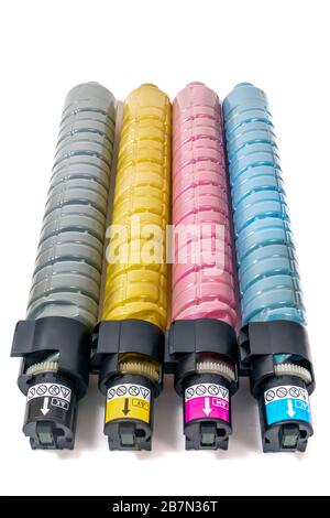 cartridges for laser printers aligned on a white background. Stock Photo