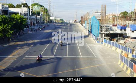 Quezon City, Philippines. 17th Mar, 2020. Metro Manila, a megacity with population of about 12 million people, is now on 'enhanced community quarantine' together with the entire Luzon island. Streets were eerily quiet (most establishment we're closed, no traffic and almost empty streets) after the government sealed off the city in a bid to contain the spread of COVID-19, the disease caused by the novel coronavirus. (Photo by Sherbien Dacalanio/Pacific Press/Sipa USA) Credit: Sipa USA/Alamy Live News Stock Photo