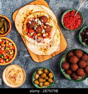 Falafel - traditional dish of Israeli and Middle Eastern cuisine, top view. Stock Photo