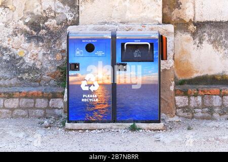 Separate garbage collection. Waste recycling concept. Containers for further processing of garbage in Croatia. Stock Photo